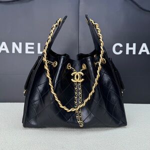 Chanel Black Quilted Bag with Gold Chain Accent